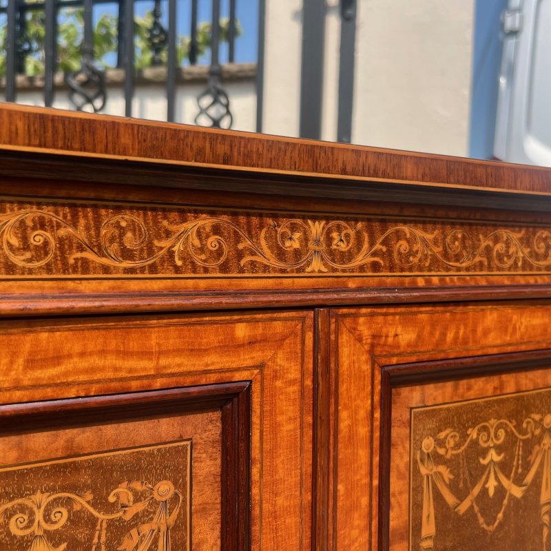 A Fine Quality Edwards and Roberts Of London marquetry inlaid music cabinet